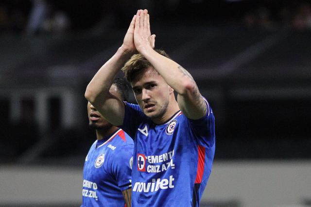 Cruz Azul's Argentine midfielder #08 Agustin Palavecino reacts after scoring his team's second goal during the Liga MX Clausura football match between Cruz Azul and Necaxa at Banorte Stadium in Mexico City on April 26, 2026. (Photo by Victor Cruz / AFP)