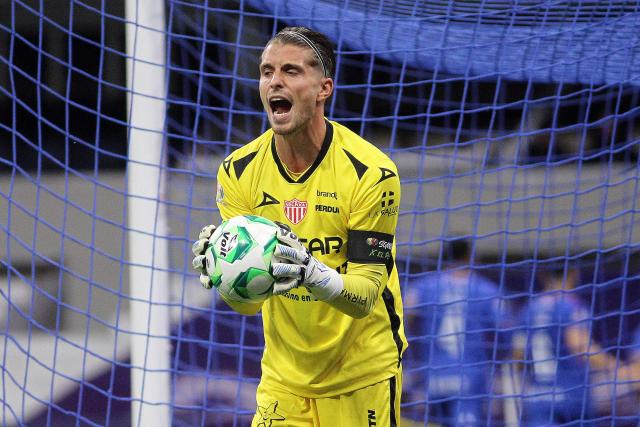 Necaxa's Argentine goalkeeper #22 Ezequiel Unsain reacts after conceding Cruz Azul's third goal scored by Cruz Azul's forward #18 Luka Romero (out of frame) during the Liga MX Clausura football match between Cruz Azul and Necaxa at Banorte Stadium in Mexico City on April 26, 2026. (Photo by Victor Cruz / AFP)