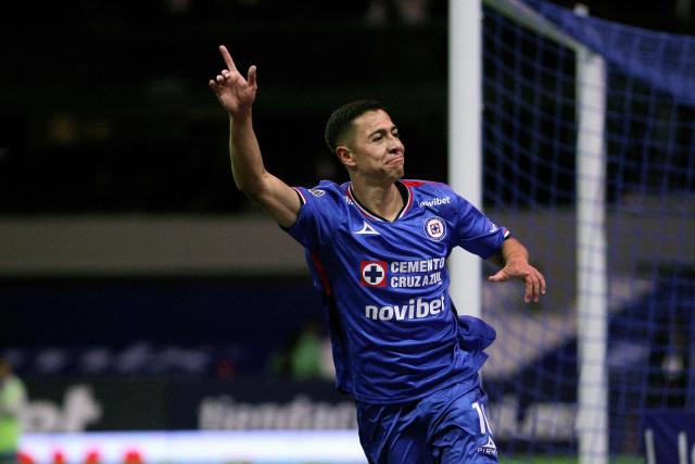 Cruz Azul's midfielder #10 Andres Montano celebrates scoring his team's fourth goal during the Liga MX Clausura football match between Cruz Azul and Necaxa at Banorte Stadium in Mexico City on April 26, 2026. (Photo by Victor Cruz / AFP)