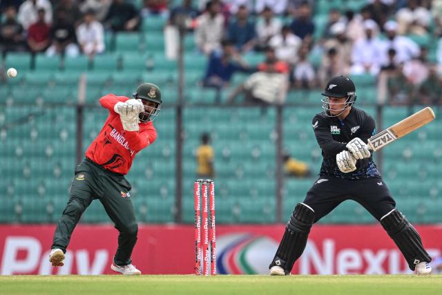 New Zealand's Katene Clarke (R) plays a shot during the first T20 cricket match between Bangladesh and New Zealand at the Bir Sreshtho Flight Lieutenant Matiur Rahman Stadium in Chittagong on April 27, 2026. (Photo by Munir UZ ZAMAN / AFP)