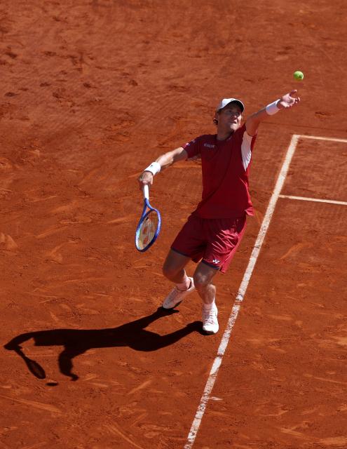 Norway’s Casper Ruud serves the ball to Spain’s Alejandro Davidovich Fokina during their 2026 ATP Tour Madrid Open tennis tournament third round singles match at the Caja Magica in Madrid, on April 27, 2026. (Photo by Thomas COEX / AFP)
