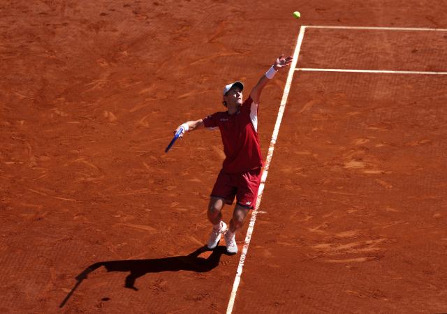 Norway’s Casper Ruud serves the ball to Spain’s Alejandro Davidovich Fokina during their 2026 ATP Tour Madrid Open tennis tournament third round singles match at the Caja Magica in Madrid, on April 27, 2026. (Photo by Thomas COEX / AFP)