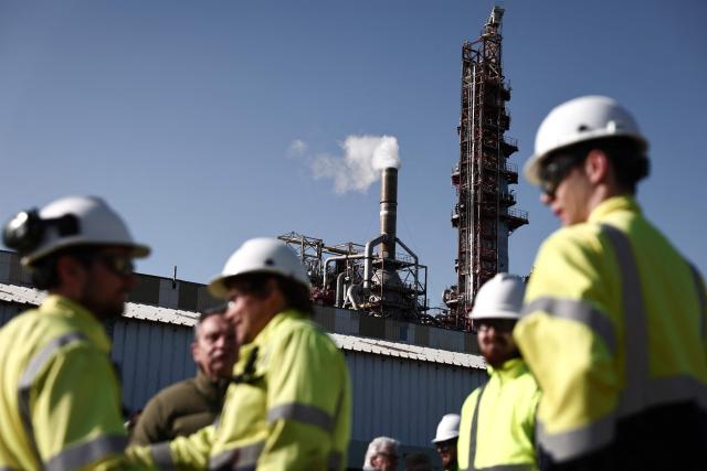 (FILES) Workers gather at the the industrial site of Fibre Excellence Group in Tarascon, south-eastern France on April 14, 2026, as two Fibre Excellence Group' sites in Tarascon and Saint-Gaudens face closure. Fibre Excellence, the owner of France’s last two pulp mills, was placed under court receivership on April 27, 2026, with a six-month observation period to find a buyer, the Toulouse Commercial Court announced. (Photo by Thibaud MORITZ / AFP)