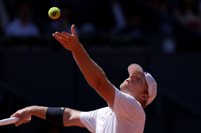 Spain’s Alejandro Davidovich Fokina serves to Norway’s Casper Ruud during their 2026 ATP Tour Madrid Open tennis tournament third round singles match at the Caja Magica in Madrid, on April 27, 2026. (Photo by Thomas COEX / AFP)