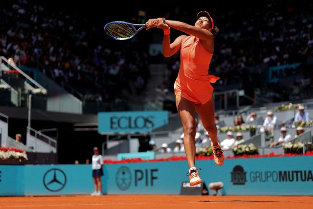 Japan’s Naomi Osaka returns the ball to  Belarus’ Aryna Sabalenka during their 2026 WTA Tour Madrid Open tennis tournament women's singles match at the Caja Magica in Madrid, on April 27, 2026. (Photo by Thomas COEX / AFP)