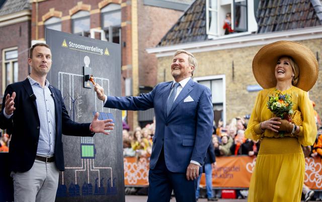 King Willem-Alexander of the Netherlands (C) and Queen Maxima of the Netherlands (R) take part in the King's Day celebrations, in Dokkum on April 27, 2026. King's day is a national holiday in the Kingdom of the Netherlands. Celebrated on 27 April the date marks the birth of King Willem-Alexander. (Photo by Sem van der Wal / various sources / AFP) / Netherlands OUT