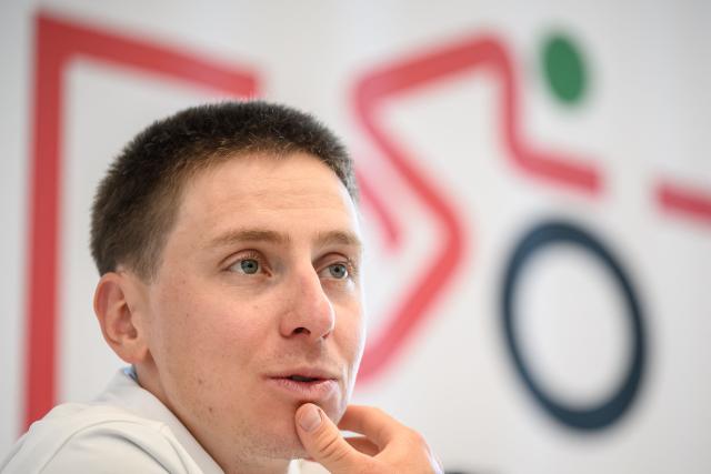 UAE Team Emirates-XRG's Slovenian rider Tadej Pogacar speaks during a press conference ahead of the Tour of Romandy cycling stage race, in Vevey, Switzerland on April 27, 2026. (Photo by Fabrice COFFRINI / AFP)
