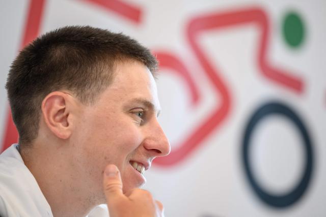 UAE Team Emirates-XRG's Slovenian rider Tadej Pogacar speaks during a press conference ahead of the Tour of Romandy cycling stage race, in Vevey, Switzerland on April 27, 2026. (Photo by Fabrice COFFRINI / AFP)
