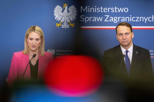 Ireland's Minister for Foreign Affairs and Trade and Minister of Defence Helen McEntee (L) and Poland's Deputy Prime Minister and Minister of Foreign Afairs Radoslaw Sikorski (R) attend a joint press conference after their meeting in Ministry building in Warsaw on April 27, 2026. (Photo by Wojtek RADWANSKI / AFP)