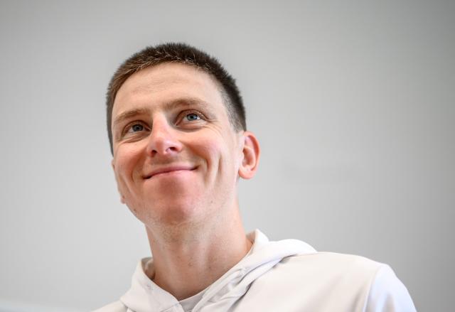 UAE Team Emirates-XRG's Slovenian rider Tadej Pogacar smiles after a press conference ahead of the Tour of Romandy cycling stage race, in Vevey, Switzerland on April 27, 2026. (Photo by Fabrice COFFRINI / AFP)