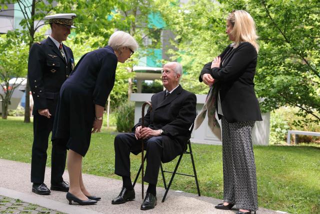 France's Defence Minister Catherine Vautrin (2L) welcomes French former Prime Minister Edouard Balladur (2R) next to General Chief of Staff of the French armed Forces Fabien Mandon (L) during a military parade to mark the naming of the Ministry of the Armed Forces’ main auditorium after Pierre Messmer, at The Invalides in Paris on April 27, 2026. (Photo by Thomas SAMSON / AFP)