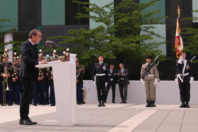 France's Prime Minister Sebastien Lecornu delivers a speech during a military parade to mark the naming of the Ministry of the Armed Forces’ main auditorium after Pierre Messmer, at The Invalides in Paris on April 27, 2026. (Photo by Thomas SAMSON / AFP)