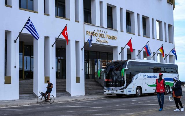 (FILES) View of the Royalton Paseo del Prado hotel in Havana on March 12, 2026. Tourist arrivals in Cuba plummeted in the first quarter of 2026, affected by the US fuel embargo and the suspension of international flights. Between January and March, the island received 298,057 foreign visitors, 48% fewer than in the same period in 2025, according to figures published by the National Office for Statistics and Information. (Photo by YAMIL LAGE / AFP)