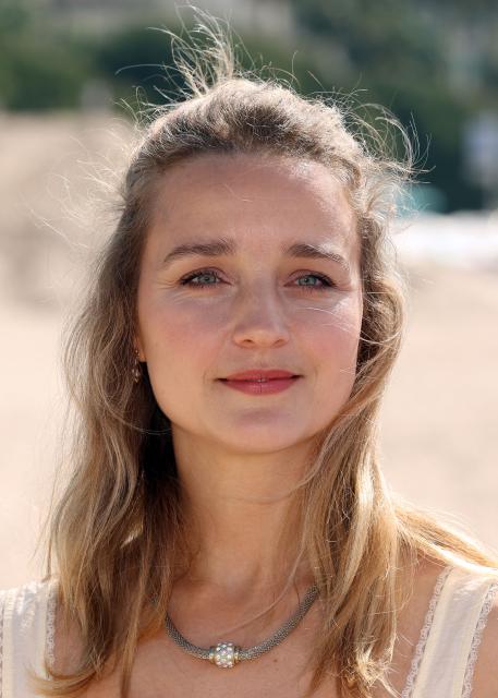 British actress Florence Hall poses during the "This is not a murder mystery" photocall as part of the 9th edition of the Canneseries international series festival in Cannes, southern France, on April 27, 2026. (Photo by Valery HACHE / AFP)