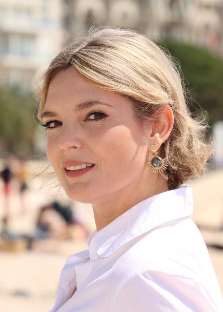 French documentary filmmaker Lea Camilleri poses during a photocall as a member of the jury of the "Documentary Series" section at the 9th Canneseries international series festival in Cannes, southern Frace, on April 27, 2026. (Photo by Valery HACHE / AFP)