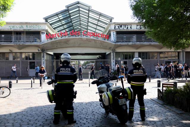 Police officers take part in a security operation in the Capucins neighbourhood, an area long plagued by drug trafficking where the new mayor has pledged reinforced policing as part of his security plan, in Bordeaux, southwestern France, on April 27, 2026. (Photo by ROMAIN PERROCHEAU / AFP)