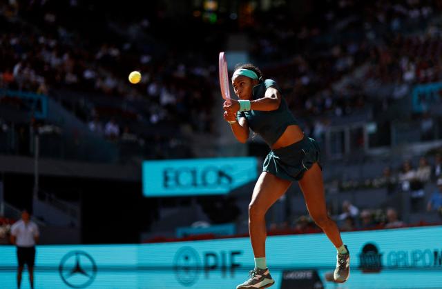US' Coco Gauff returns the ball to Czech Republic's Linda Noskova during their 2026 WTA Tour Madrid Open tennis tournament women's singles match at the Caja Magica in Madrid, on April 27, 2026. (Photo by OSCAR DEL POZO / AFP)