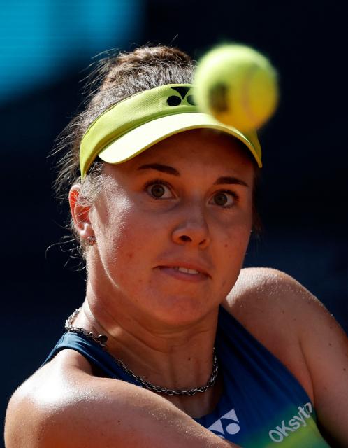 Czech Republic's Linda Noskova returns the ball to US' Coco Gauff during their 2026 WTA Tour Madrid Open tennis tournament women's singles match at the Caja Magica in Madrid, on April 27, 2026. (Photo by OSCAR DEL POZO / AFP)