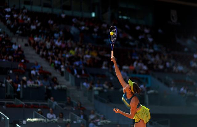 Czech Republic's Linda Noskova serves to US' Coco Gauff during their 2026 WTA Tour Madrid Open tennis tournament women's singles match at the Caja Magica in Madrid, on April 27, 2026. (Photo by OSCAR DEL POZO / AFP)