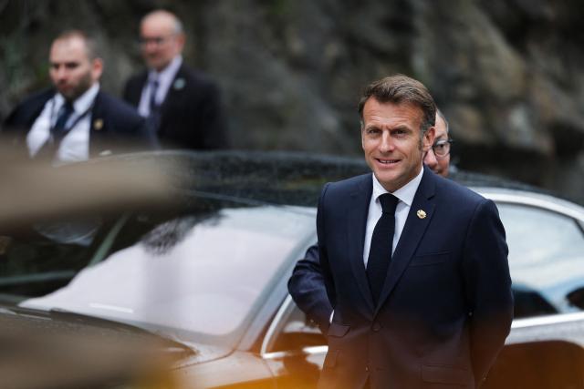 France's President and Co-Prince of Andorra Emmanuel Macron arrives for a visit at the FEDA hydroelectric power plant in Andorra la Vella, in Andorra, on April 27, 2026. Emmanuel Macron will travel to south western France's Ariège department on April 27, 2026, a trip focused on reindustrialization and health, before a two-day visit to the microstate of Andorra of which his is also Co-Prince, where the sensitive issue of abortion will be discussed. (Photo by Valentine CHAPUIS / POOL / AFP)