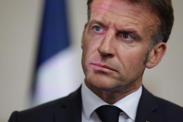 France's President and Co-Prince of Andorra Emmanuel Macron is pictured at the start of a two-day official visit covering institutional talks on housing, abortion decriminalisation and Andorra's EU association agreement in Andorra, on April 27, 2026. (Photo by Valentine CHAPUIS / POOL / AFP)