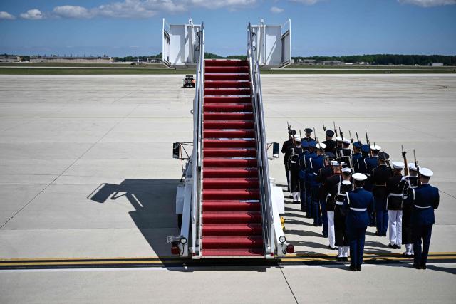 An honor guard prepares for the arrival of Britain's King Charles III and Queen Camilla at Joint Base Andrews, Maryland, on April 27, 2026. (Photo by Kent NISHIMURA / AFP)