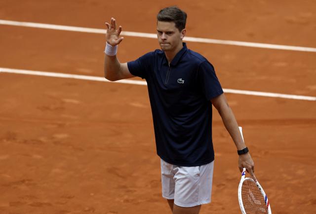 Belgium's Alexander Blockx celebrates after winning the 2026 ATP Tour Madrid Open tennis tournament third round singles tennis match against Canada's Felix Auger-Aliassime at the Caja Magica in Madrid, on April 27, 2026. (Photo by OSCAR DEL POZO / AFP)