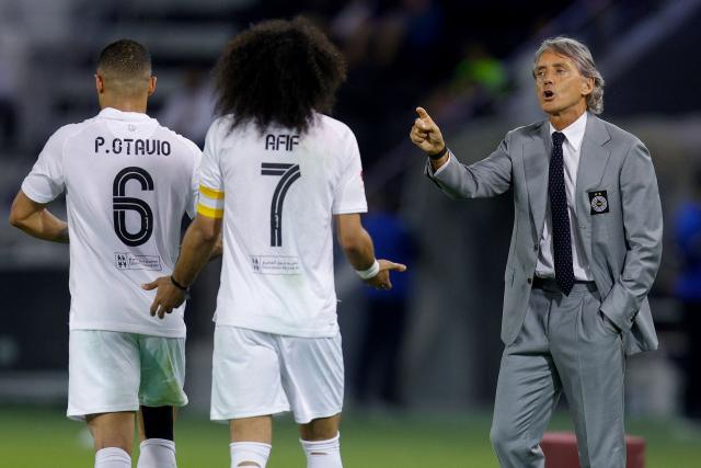 Sadd's Italian coach Roberto Mancini instructs his players during the Qatar Stars League match between Al-Sadd and Al-Shamal at Jassim Bin Hamad Stadium in Doha on April 27, 2026. (Photo by Karim JAAFAR / AFP)