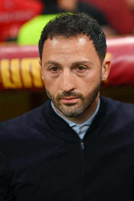 Fenerbahce's Italian head coach Domenico Tedesco looks on from the technical area during the Turkish Super lig football match between Fenerbahce and Galatasaray at the Rams Park Stadium in Istanbul, on April 26, 2026. Turkish club Fenerbahçe sacked their coach, the Italian-German Domenico Tedesco, on April 27, 2026, a day after a disastrous 3-0 derby defeat in the league against league leaders Galatasaray, a loss that crushed their last hopes of a title. "We have parted ways with our coach Domenico Tedesco," Fenerbahçe wrote in a statement. The club trails their arch-rivals Galatasaray by seven points with three matches remaining in the season. (Photo by Yasin AKGUL / AFP)