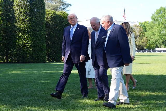 US President Donald Trump, First Lady Melania Trump, Britain's King Charles III and Britain's Queen Camilla tour the White House beehive on the South Lawn of the White House in Washington, DC, on April 27, 2026. (Photo by Alex Brandon / POOL / AFP)
