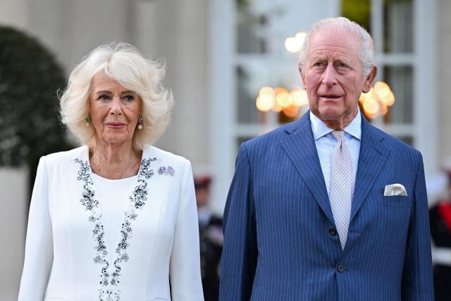 Britain's King Charles III and Britain's Queen Camilla attend a garden party at the British Ambassador's Residence in Washington, DC, on April 27, 2026. (Photo by Samir HUSSEIN / POOL / AFP)