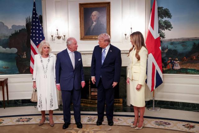 (L-R) Britain's Queen Camilla, Britain's King Charles III, US President Donald Trump and First Lady Melania Trump pose for photos during their visit to the White House in Washington, DC, on April 27, 2026. (Photo by Suzanne Plunkett / POOL / AFP)