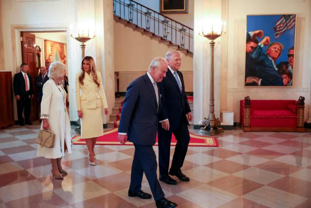 (L-R) Britain's Queen Camilla, US First Lady Melania Trump, Britain's King Charles III and US President Donald Trump tour the White House during their visit in Washington, DC, on April 27, 2026. (Photo by Suzanne Plunkett / POOL / AFP)