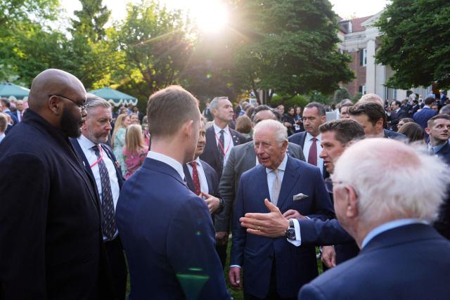 British Ambassador to the US Christian Turner introduces attendees to Britain's King Charles III during a garden party at the British Ambassador's Residence in Washington, DC, on April 27, 2026. (Photo by Julia Demaree Nikhinson / POOL / AFP)