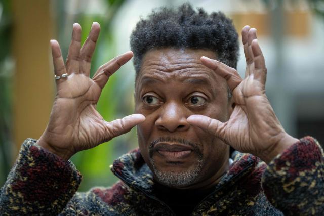 United States' saxophonist Ravi Coltrane gestures during an AFP interview ahead of a concert in honor of Miles Davis and John Coltrane, at which he will perform with trumpeter and composer Terence Blanchard in Wroclaw as part of the Jazz nad Odra festival on April 26, 2026. Awash in purple and turquoise stage lights, a century after the birth of two of jazz's most formidable legacies -- Miles Davis and John Coltrane -- Ravi Coltrane and Terence Blanchard are refusing to recreate the past. (Photo by Wojtek RADWANSKI / AFP)