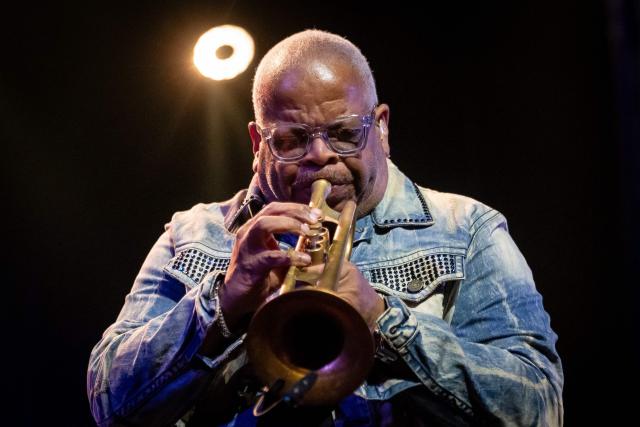 United States' trumpet player and composer Terence Blanchard performes on the stage of the Impart jazz club in Wroclaw during his concert with saxophonist Ravi Coltrane in honor of Miles Davis and John Coltrane as part of the Jazz nad Odra festival on April 26, 2026. Awash in purple and turquoise stage lights, a century after the birth of two of jazz's most formidable legacies -- Miles Davis and John Coltrane -- Ravi Coltrane and Terence Blanchard are refusing to recreate the past. (Photo by Wojtek RADWANSKI / AFP)