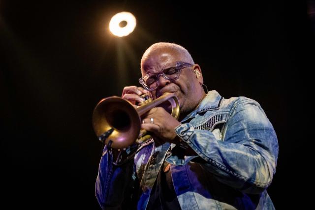 United States' trumpet player and composer Terence Blanchard performes on the stage of the Impart jazz club in Wroclaw during his concert with saxophonist Ravi Coltrane in honor of Miles Davis and John Coltrane as part of the Jazz nad Odra festival on April 26, 2026. Awash in purple and turquoise stage lights, a century after the birth of two of jazz's most formidable legacies -- Miles Davis and John Coltrane -- Ravi Coltrane and Terence Blanchard are refusing to recreate the past. (Photo by Wojtek RADWANSKI / AFP)