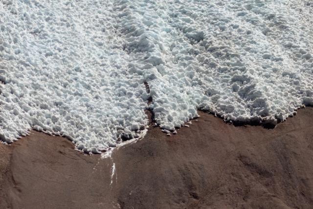 This aerial view shows the glacier known as Agua Negra, in the Andes Mountains in Iglesia, San Juan province, Argentina, on April 23, 2026. (Photo by Luis ROBAYO / AFP)