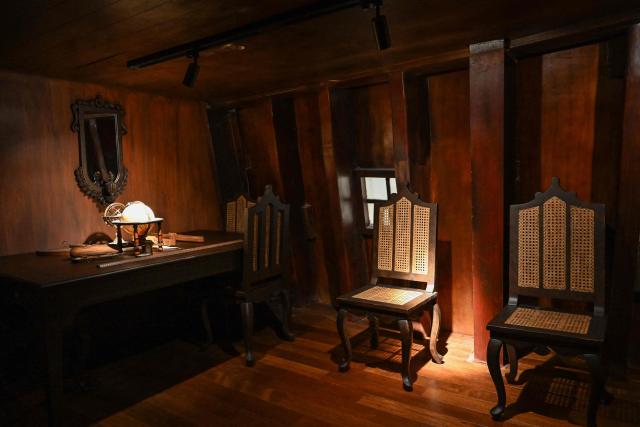 This photo taken on April 21, 2026 shows an interior view of the Galeon Espiritu Santo, a full-scale representation of a 17th century galleon, on display at the Museo del Galeon in Manila. A full-size replica of a Spanish galleon stares out into Manila Bay, the centrepiece of a museum that will transport visitors back to the 17th century, when conscripted Philippine mariners birthed the era of globalisation. (Photo by Jam STA ROSA / AFP) / To go with AFP story Philippines-history-culture-Spain-shipping, FOCUS by Cecil MORELLA