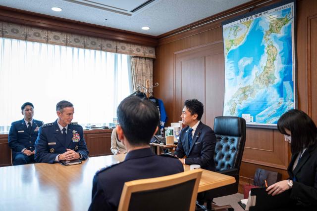 Japan’s Defence Minister Shinjiro Koizumi (2nd R) and Commander of the US Pacific Air Forces (PACAF) Gen. Kevin Schneider (2nd L) attend their meeting at the Defence Ministry in Tokyo on April 28, 2026. (Photo by Yuichi YAMAZAKI / AFP)
