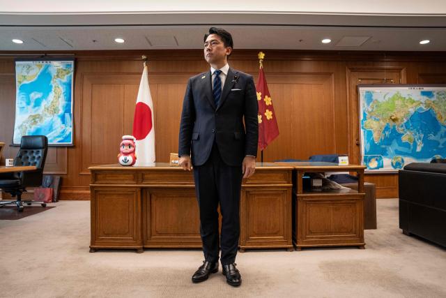 Japan’s Defence Minister Shinjiro Koizumi waits for Commander of the US Pacific Air Forces (PACAF) Gen. Kevin Schneider (not pictured) before their meeting at the Defence Ministry in Tokyo on April 28, 2026. (Photo by Yuichi YAMAZAKI / AFP)