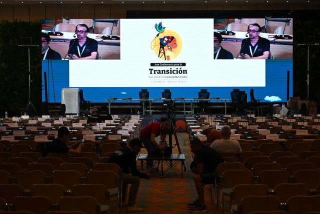 Workers prepare the venue at the Estelar Convention Center ahead of the International Conference on the Just Transition Away from Fossil Fuels in Santa Marta, Colombia, on April 27, 2026. (Photo by Raul ARBOLEDA / AFP)