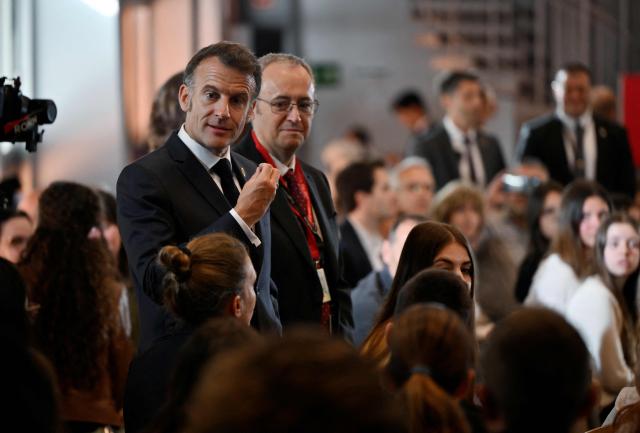 France's President and Co-Prince of Andorra Emmanuel Macron speaks to students and teachers at Lycee Comte de Foix in Andorra la Vella, on the second day of his visit to the microstate of Andorra on April 28, 2026. (Photo by Ed JONES / POOL / AFP)