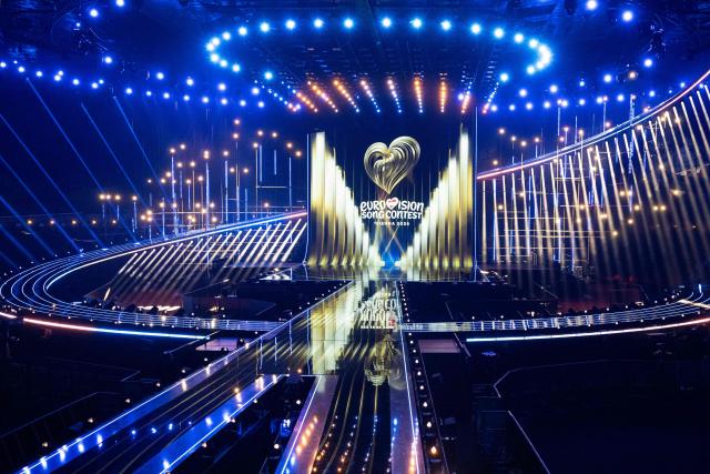 A light show is seen during the official opening of the stage attended by the Austrian President at the Wiener Stadthalle prior to the 70th Eurovision Song Contest (ESC), in Vienna, Austria on April 28, 2026. Vienna will host the two semi-finals of the ESC taking place on May 12 and May 14 and the final on May 16, 2026. (Photo by Joe Klamar / AFP)