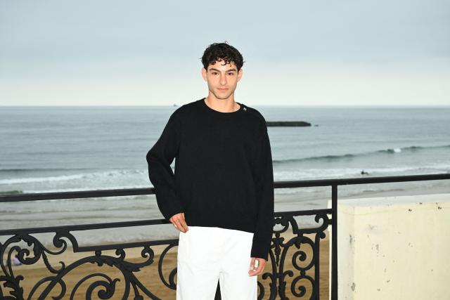 French actor Sayyid El Alami poses during a photocall ahead of the presentation of the Chanel Cruise 2026/2027 collection in Biarritz on April 28, 2026. (Photo by GAIZKA IROZ / AFP)