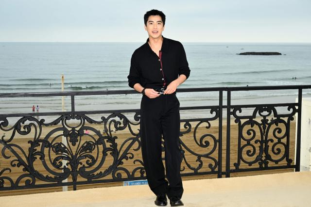 Taiwanese actor Jing-Hua Tseng poses during a photocall ahead of the presentation of the Chanel Cruise 2026/2027 collection in Biarritz on April 28, 2026. (Photo by GAIZKA IROZ / AFP)