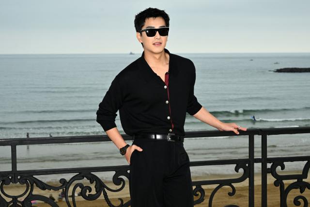 Taiwanese actor Jing-Hua Tseng poses during a photocall ahead of the presentation of the Chanel Cruise 2026/2027 collection in Biarritz on April 28, 2026. (Photo by GAIZKA IROZ / AFP)