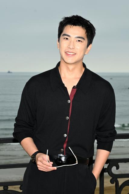 Taiwanese actor Jing-Hua Tseng poses during a photocall ahead of the presentation of the Chanel Cruise 2026/2027 collection in Biarritz on April 28, 2026. (Photo by GAIZKA IROZ / AFP)