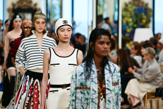 Models present creations for the Chanel Cruise 2026/2027 collection in Biarritz on April 28, 2026. (Photo by GAIZKA IROZ / AFP)