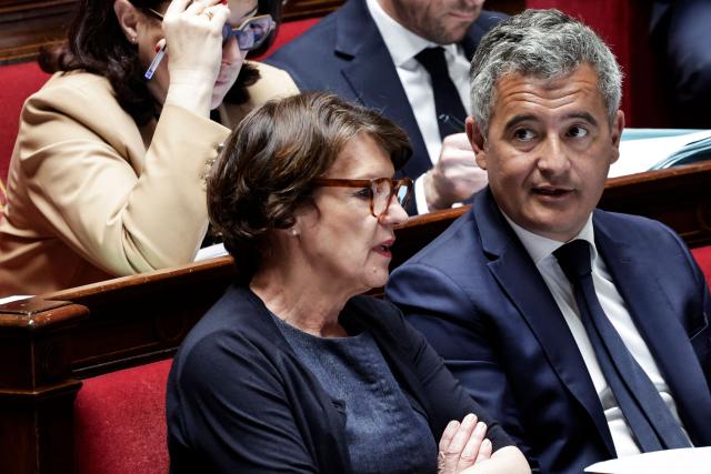 France's Agriculture Minister Annie Genevard (L) speaks with France's Justice Minister Gerald Darmanin (R) session of questions to the government at the National Assembly, French Parliament lower house, in Paris on April 28, 2026. (Photo by STEPHANE DE SAKUTIN / AFP)